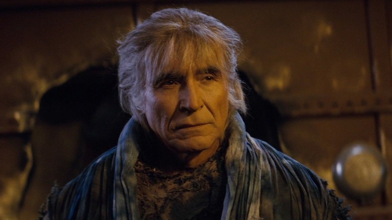 Khan looking concerned