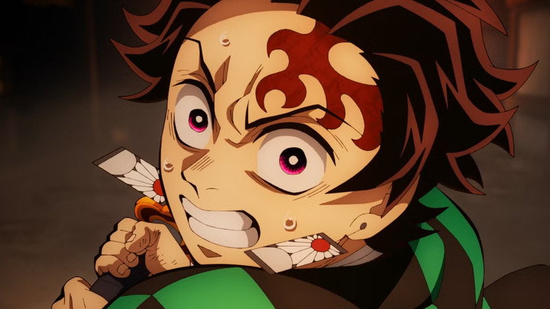 Tanjiro swings his sword in 