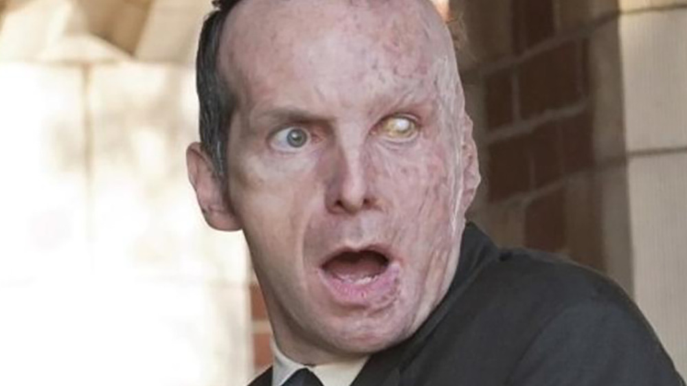 Denis O'Hare as Larry Harvey in American Horror Story: Murder House