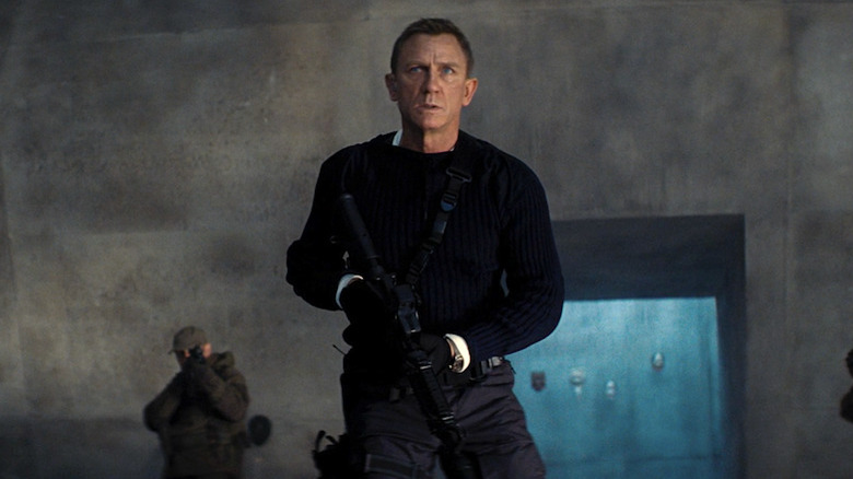 James Bond holding a rifle