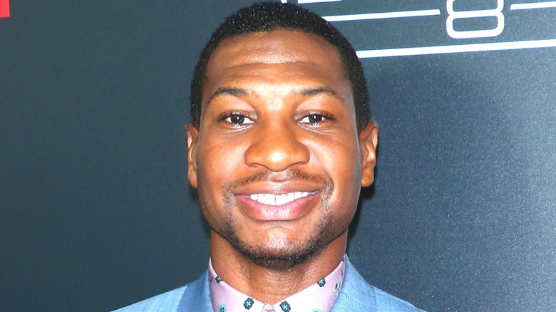 Jonathan Majors smiling