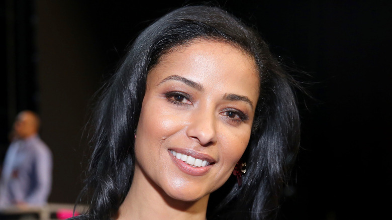 Meta Golding smiling at event