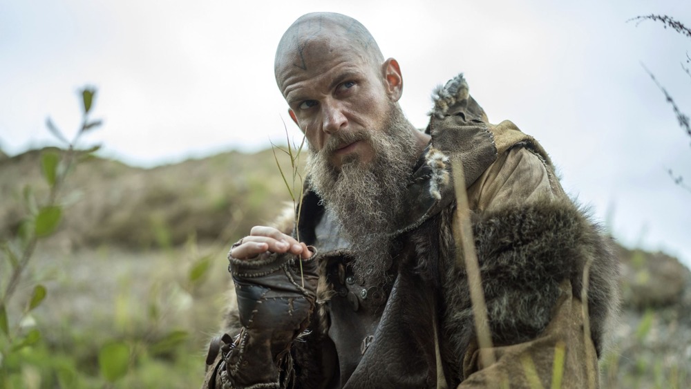 Floki holding a twig