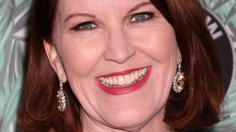 Kate Flannery smiling at an event