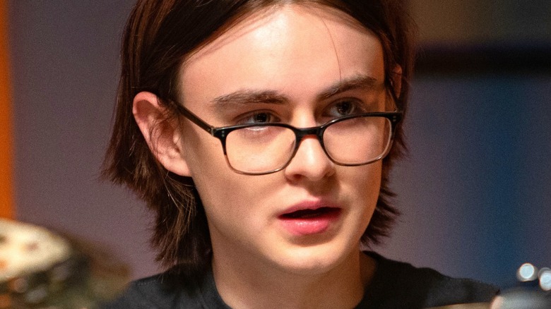 Jaeden Martell wearing glasses in Metal Lords