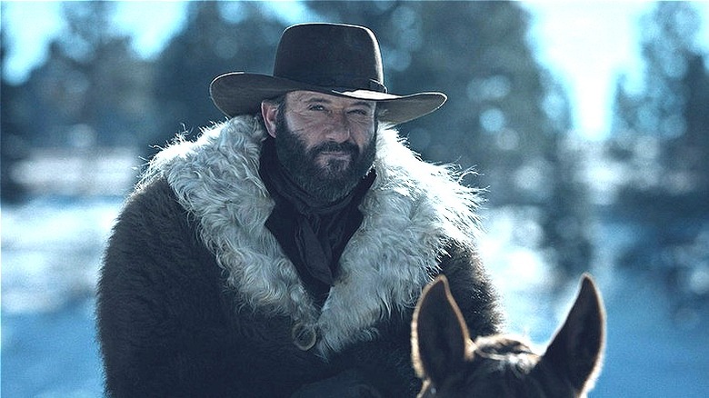 James Dutton riding a horse