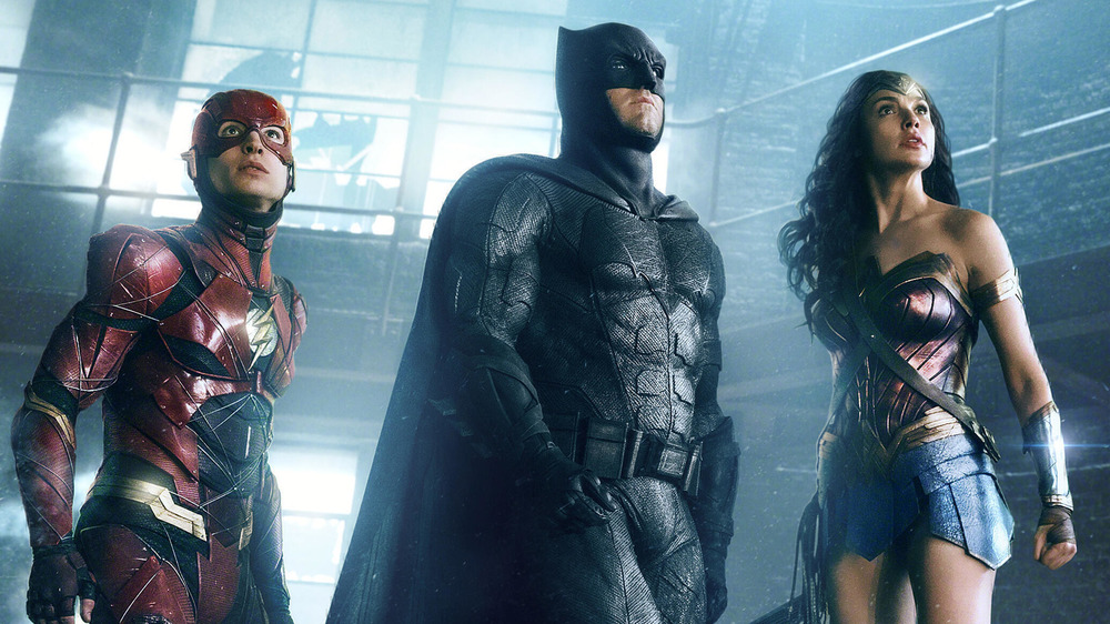 The Flash, Batman, Wonder Woman look up