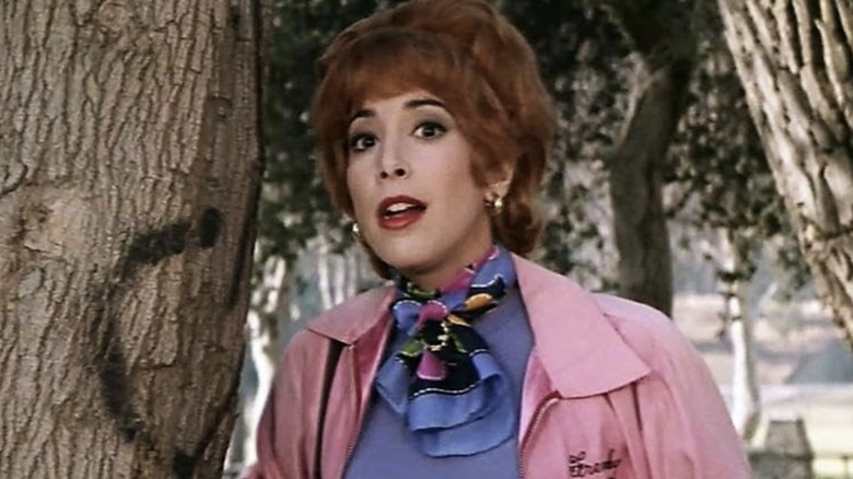 Frencht stands by a tree in "Grease 2" (1982)