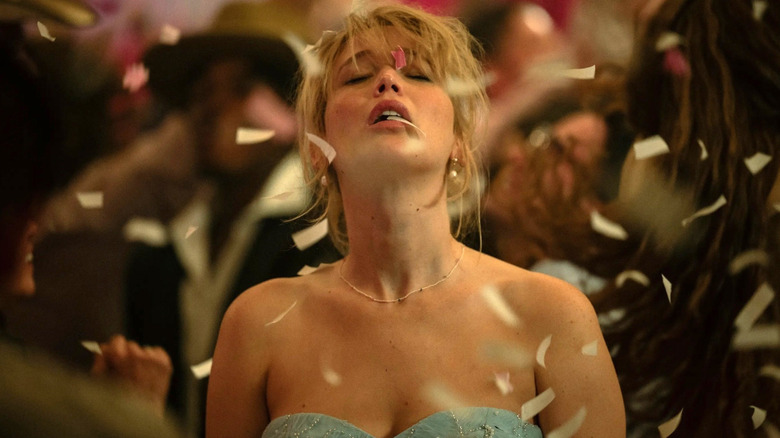 Grace dancing under confetti at her wedding party in 