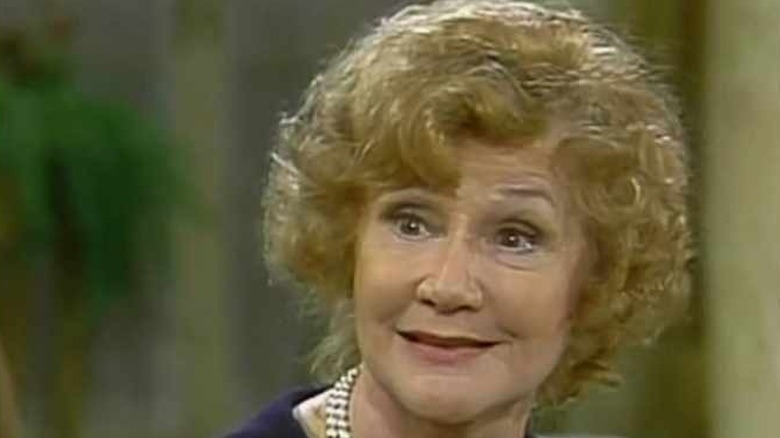 Dody Goodman smirks