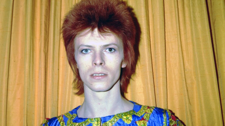 David Bowie posing as Ziggy Stardust
