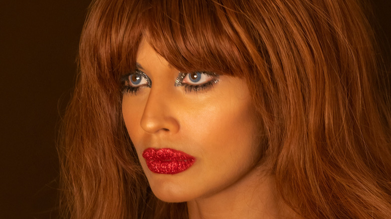 Jameela Jamil as Titania wearing glittery makeup