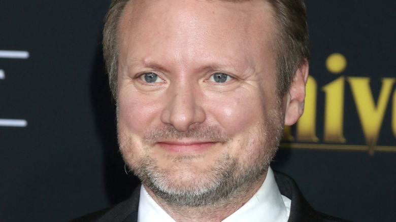 Rian Johnson smiles pleasantly