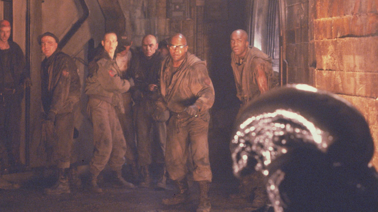 Ellen Ripley and other prisoners cornered by the Xenomorph in "Alien 3" (1992)