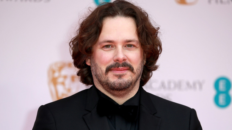 Edgar Wright posing at the EE British Academy Film Awards 2022