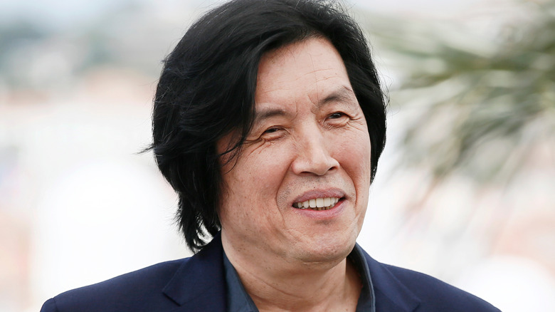 Lee Chang-dong outside