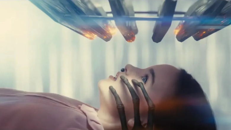 Young Margaret being tested on by aliens in Disclosure Day