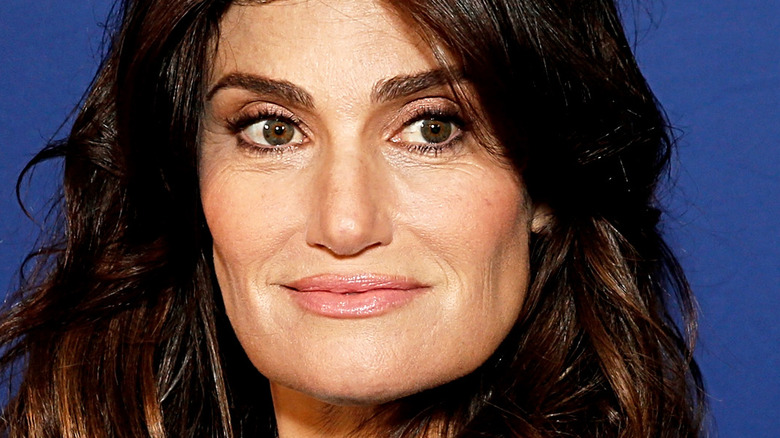 Idina Menzel looks away from camera