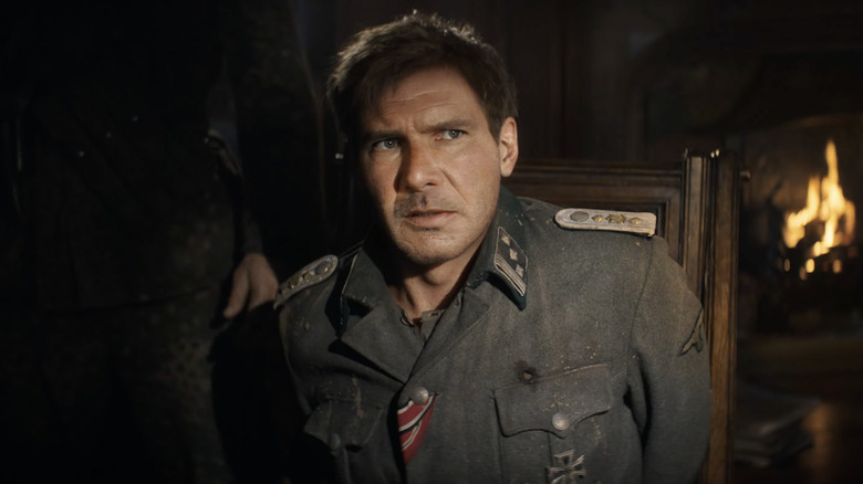 Young Indiana Jones sitting in chair