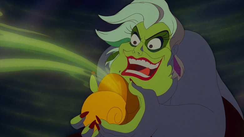 Ursula looking devious with necklace