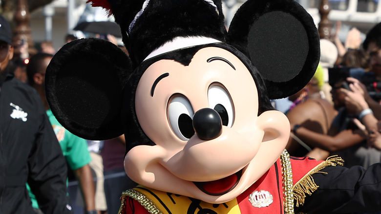 Mickey Mouse leading a parade