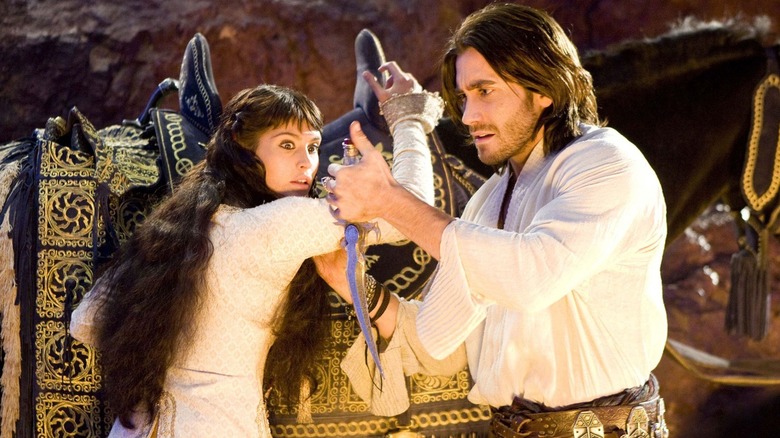 Princess Tamina of Alamut and Prince Dastan of Persia obsessing over a dagger in Prince of Persia: The Sands of Time (2010)