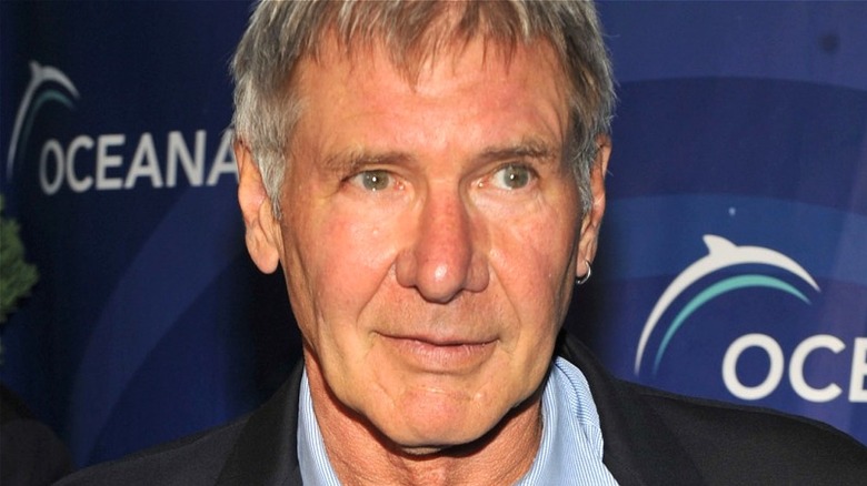 Harrison Ford posing for pictures