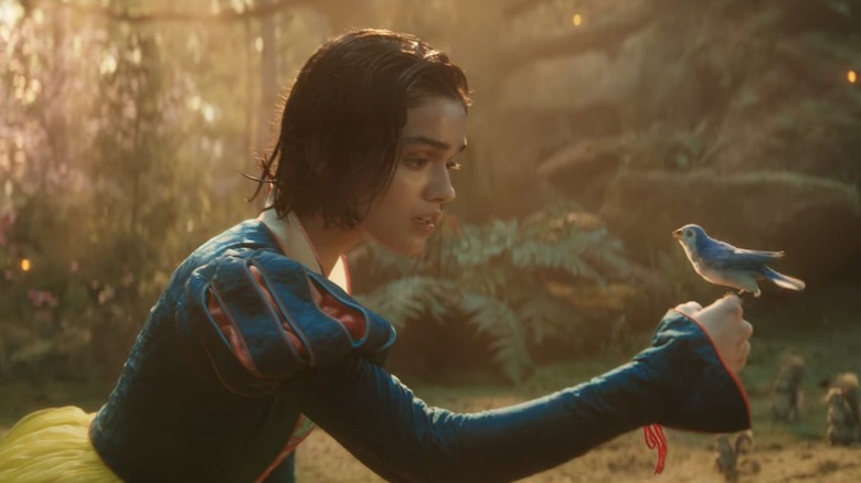 Snow White talking to a little bird