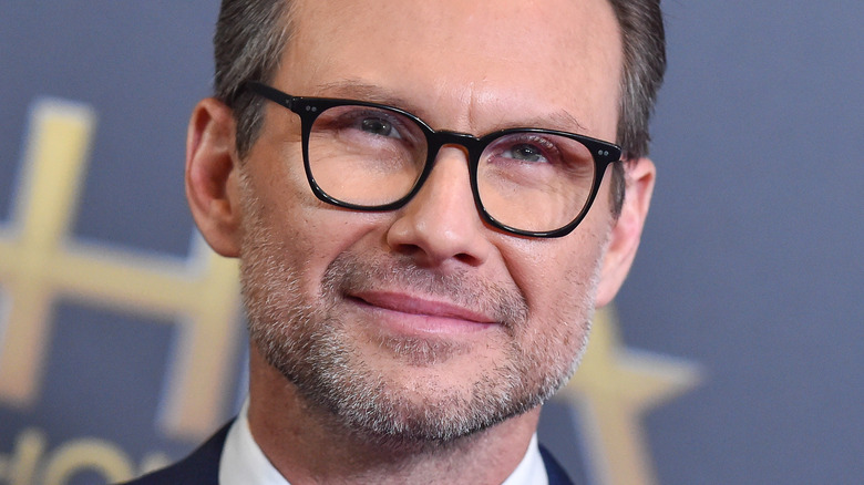 Christian Slater looking pleased