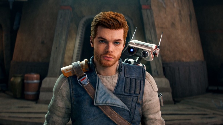 Cal Kestis staring into the camera with BD-1 on his shoulder in Star Wars Jedi: Fallen Order