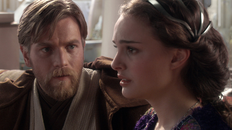 Padme looking distraught in her Coruscant apartment while Obi-Wan looks on worriedly in Star Wars: Revenge of the Sith