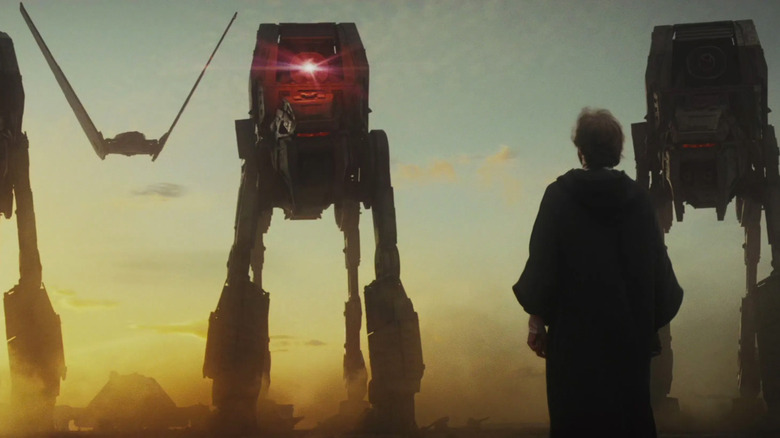 Luke Skywalker staring down First Order walkers and Kylo Ren's shuttle in Star Wars: The Last Jedi