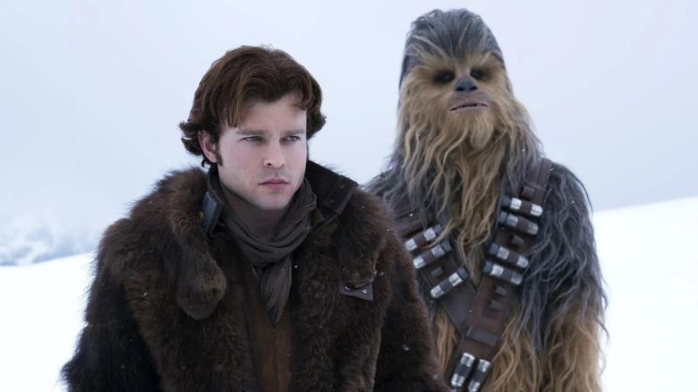 Han and Chewbacca in the snow in Solo: A Star Wars Story (2018)