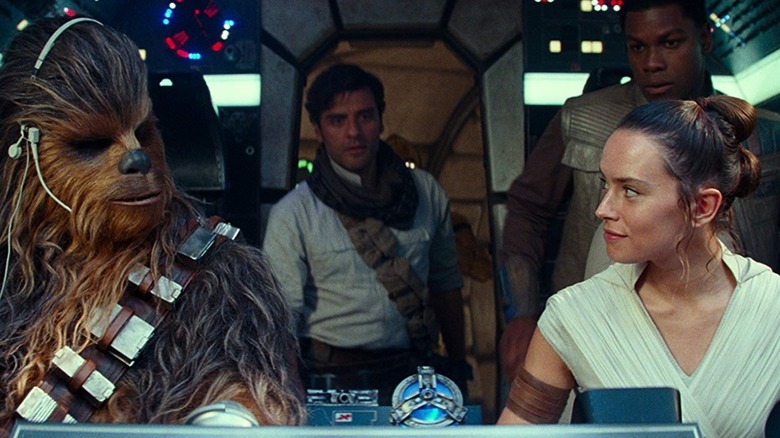 The main characters of Star Wars: The Rise of Skywalker preparing for an adventure (2019)