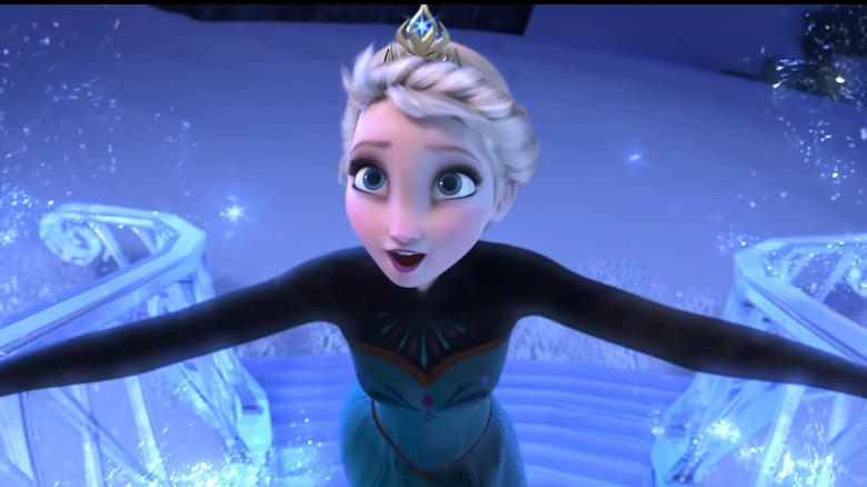 Elsa singing and running up stairs
