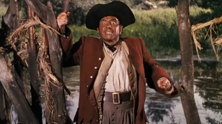 Long John Silver holding gun