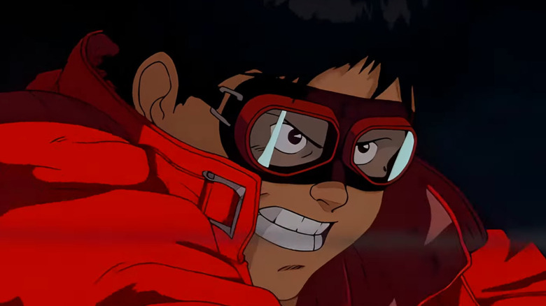 Kaneda driving his motorcycle