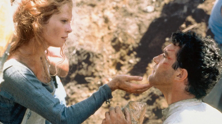 Wealhtheow caressing Ahmad's chin in The 13th Warrior