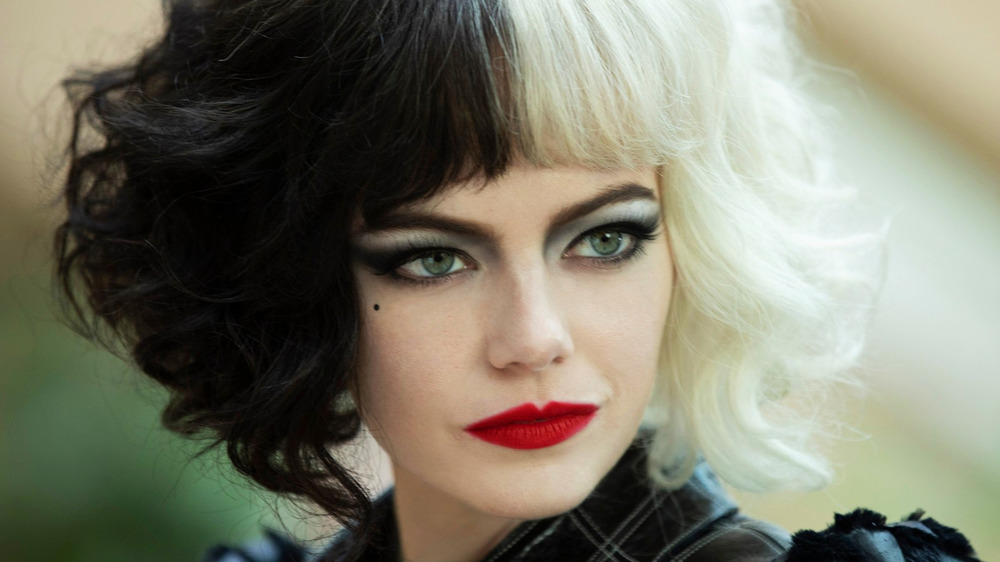 Emma Stone Cruella black and white hair red lipstick