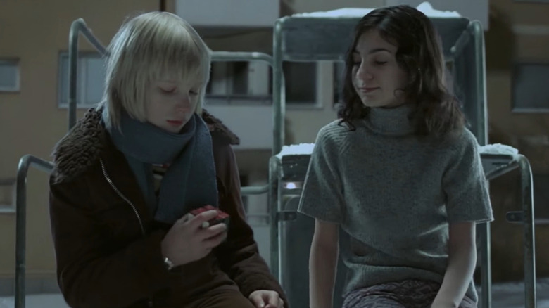 Two children in a courtyard