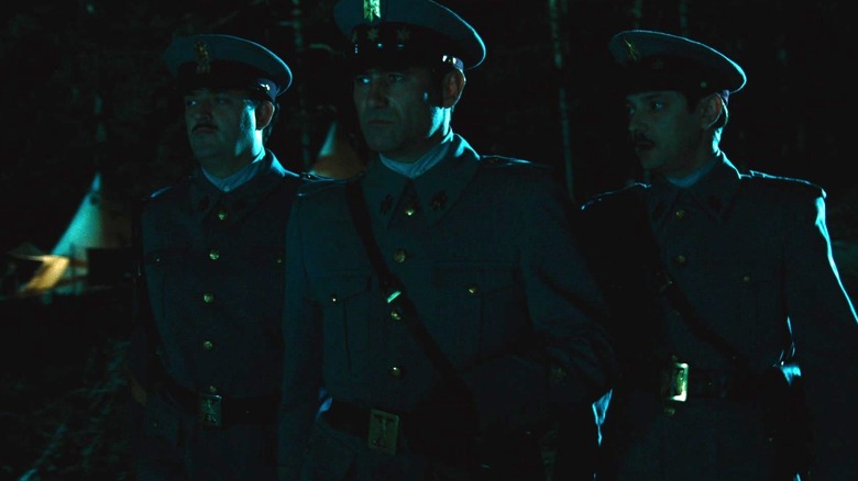 Vidal beating hunter with wine bottle