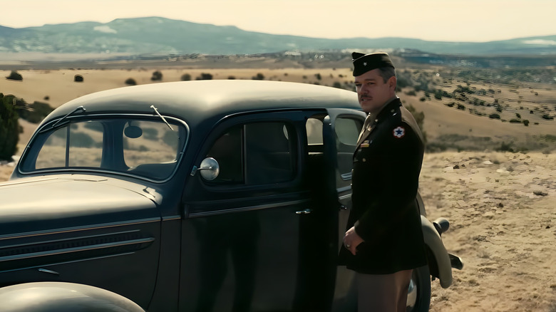 Leslie Groves gets into a car