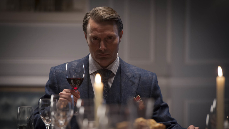 Hannibal holding wine
