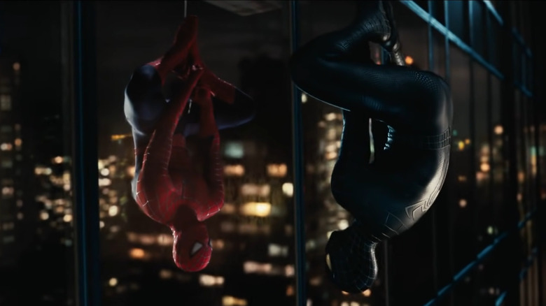 Spider-Man looking at his reflection in the Symbiote Suit