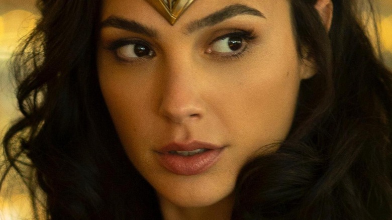 Diana Prince against a gold background