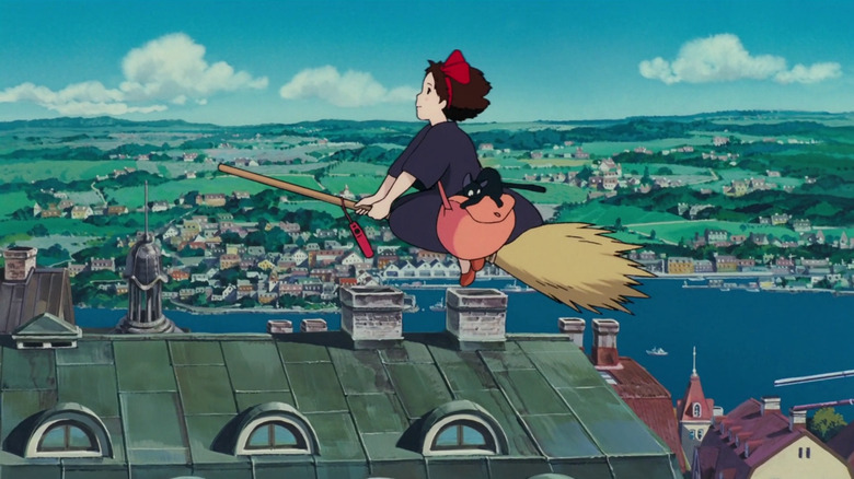 Kiki flies on her broom