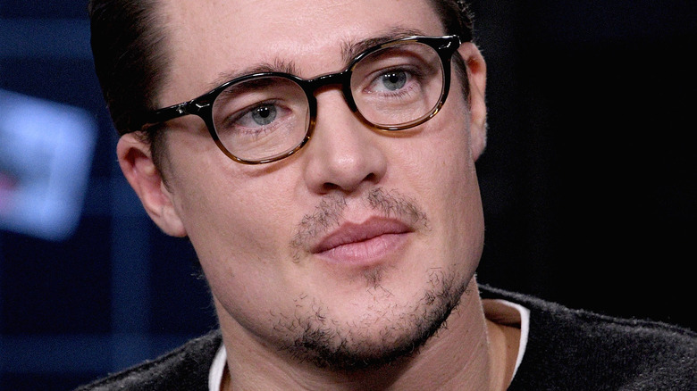 Alexander Dreymon wearing glasses 