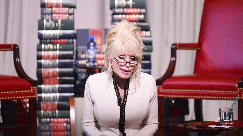 Dolly Parton reading at an event