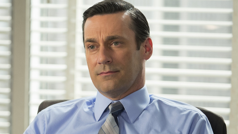 Don Draper smiling slightly