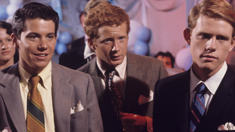 Ralph standing between Richie and Potsie at dance